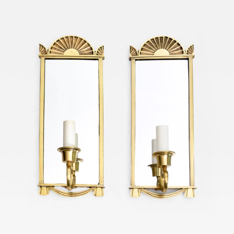 Pair of Swedish Grace era polished brass mirrored sconces 