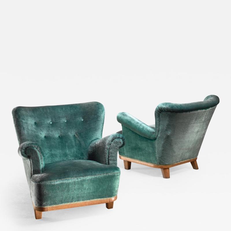 Pair of Swedish easy chairs 1940s