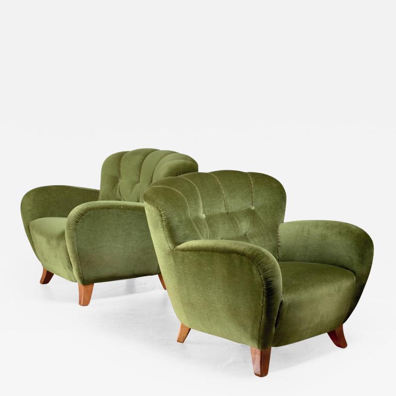 Pair of Swedish green easy chairs 1940s