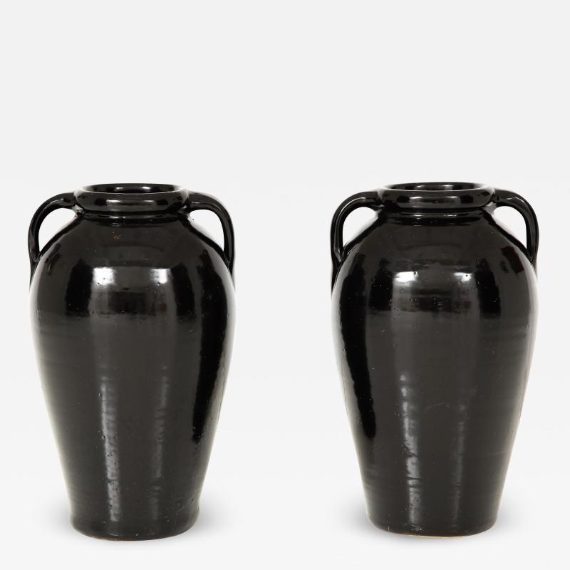 Pair of Tall Black Glazed Stone Pottery Vases