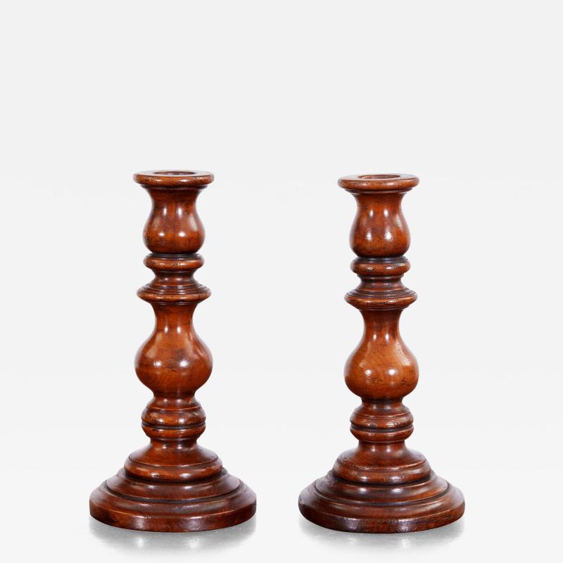 Pair of Turned Fruitwood Candlesticks