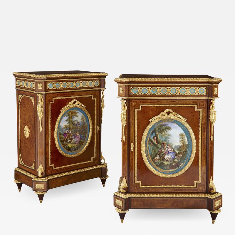 Pair of Victorian period amboyna cabinets with S vres style porcelain plaques