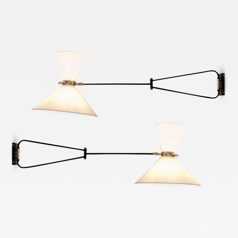 Pair of adjustable and foldable wall lights by Arlus France circa 1950