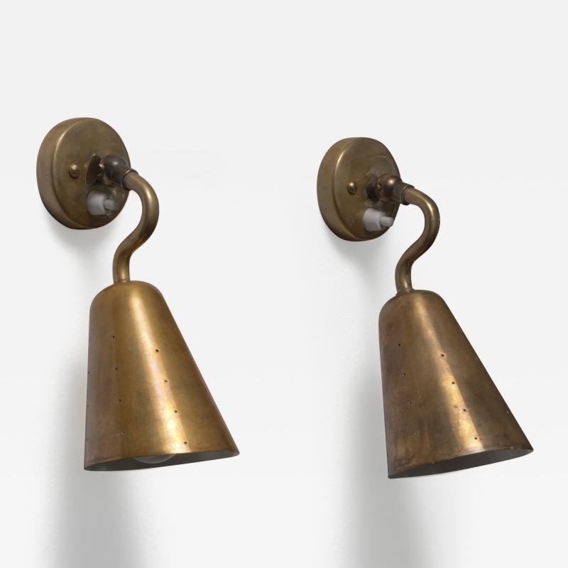 Pair of adjustable brass wall lamps
