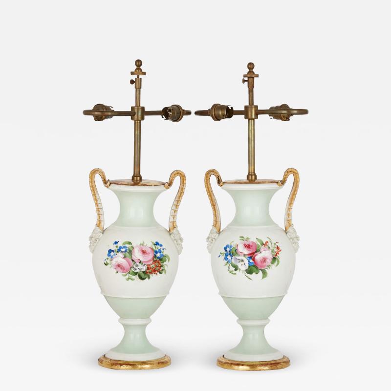 Pair of antique porcelain vase form lamps with floral decoration
