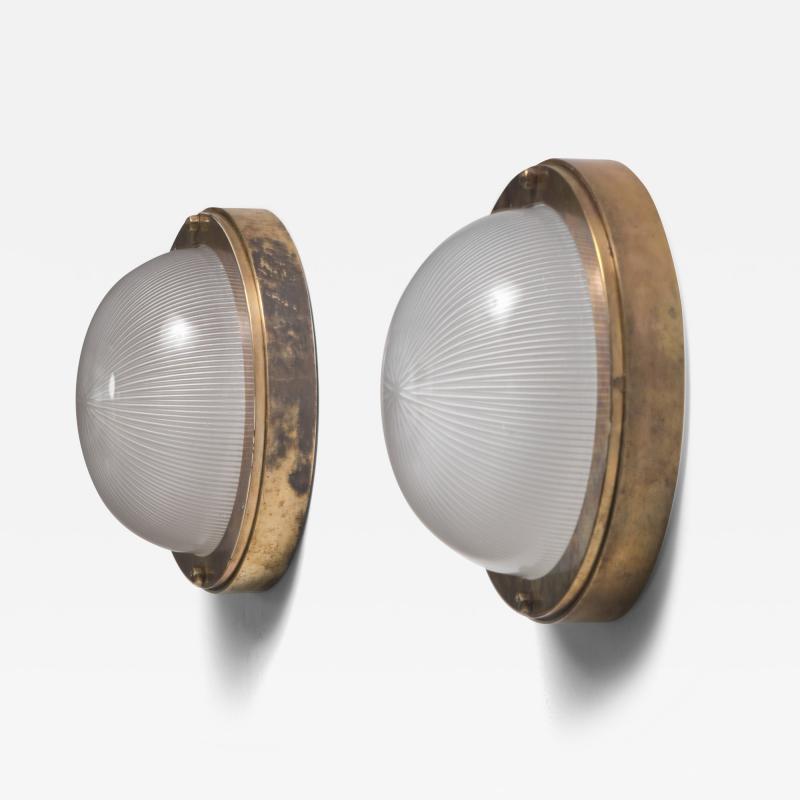 Pair of brass and glass wall lamps