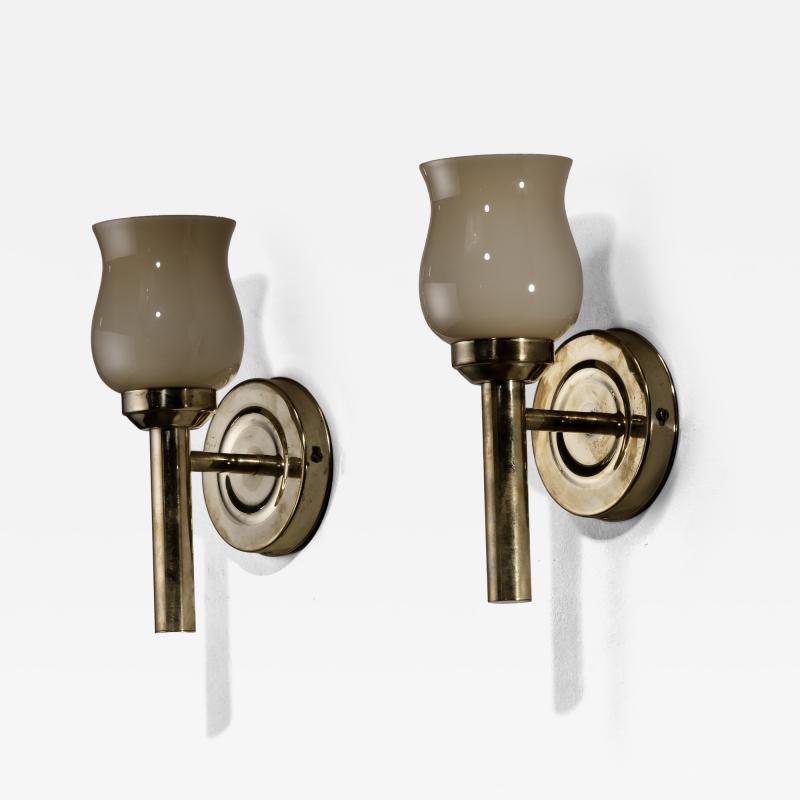 Pair of brass and glass wall lamps