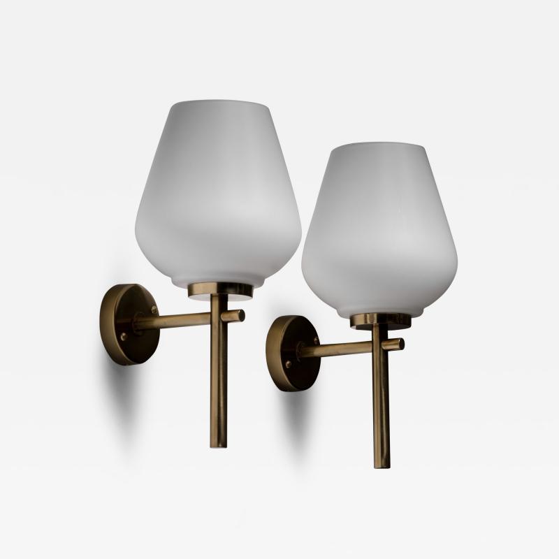 Pair of brass and opaline glass wall lamps