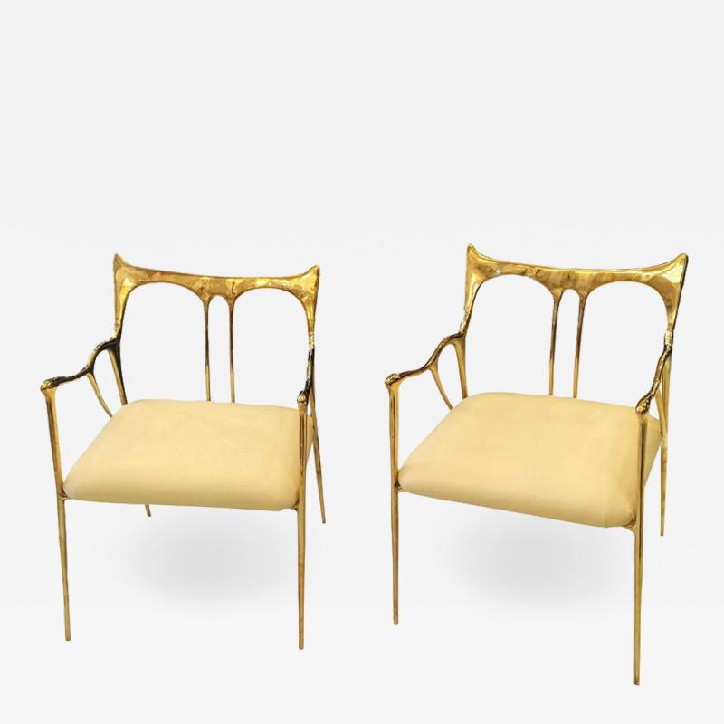 Pair of bronze armchairs