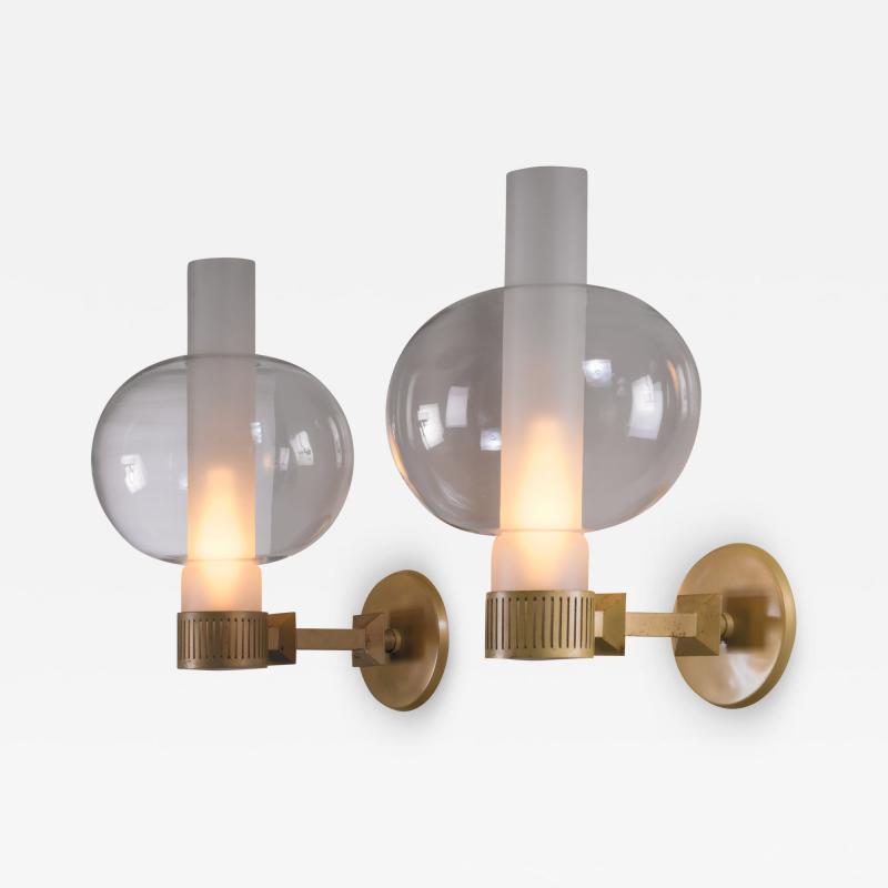 Pair of bronzed metal and glass wall lamps