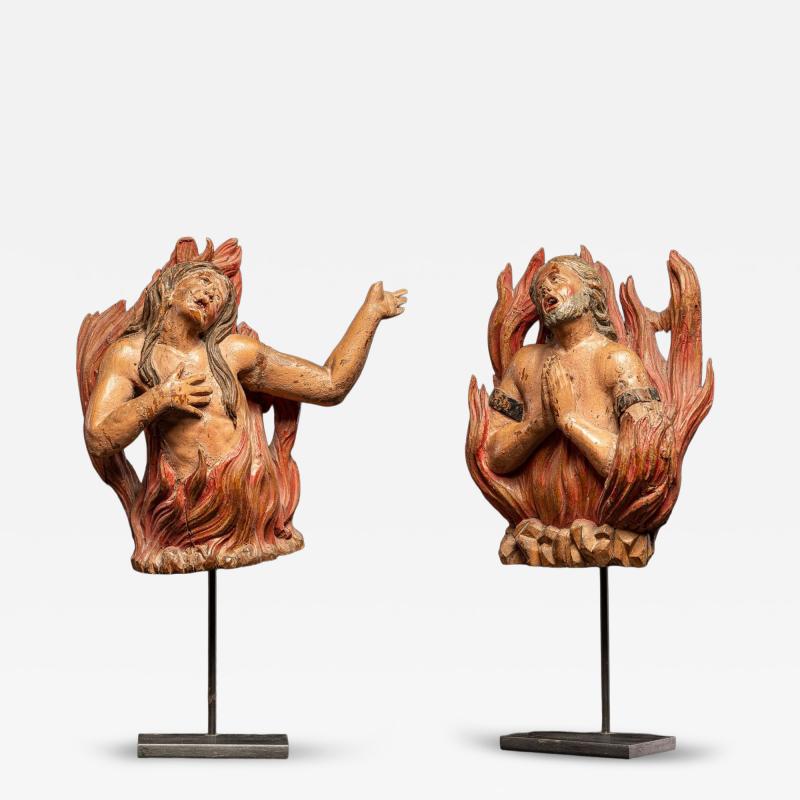 Pair of carved oak Souls in Purgatory male and female 17th C Southern Europe