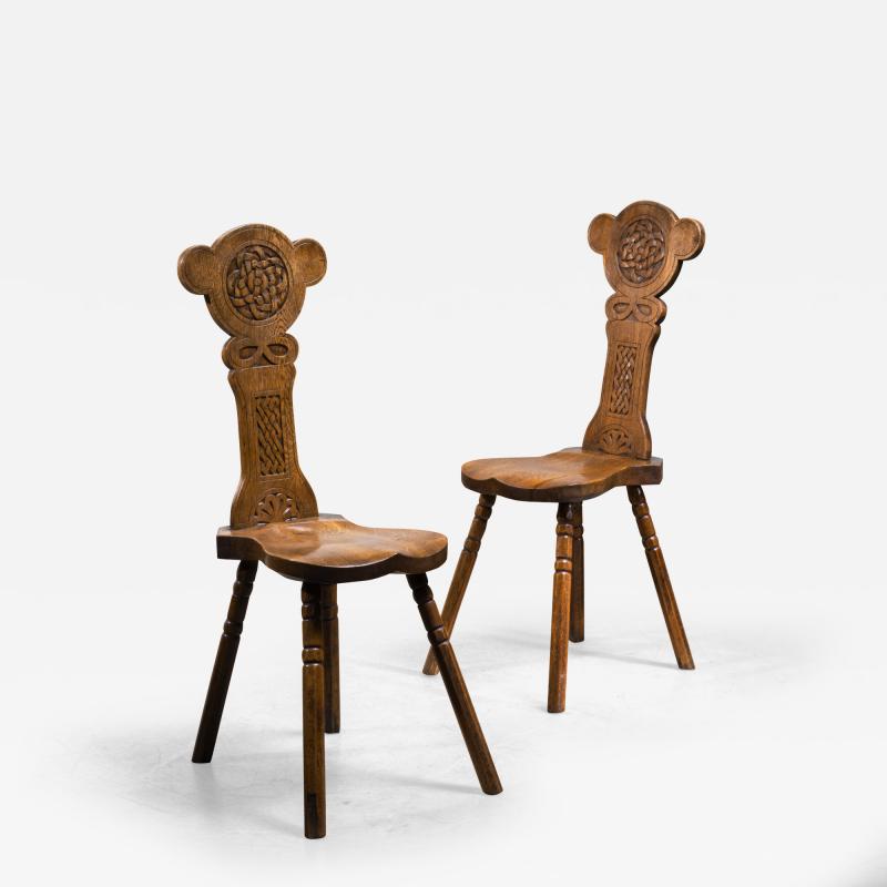 Pair of carved oak dining chairs