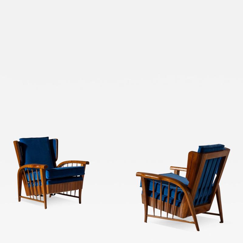 Pair of cherrywood lounge chairs Italy 1950s