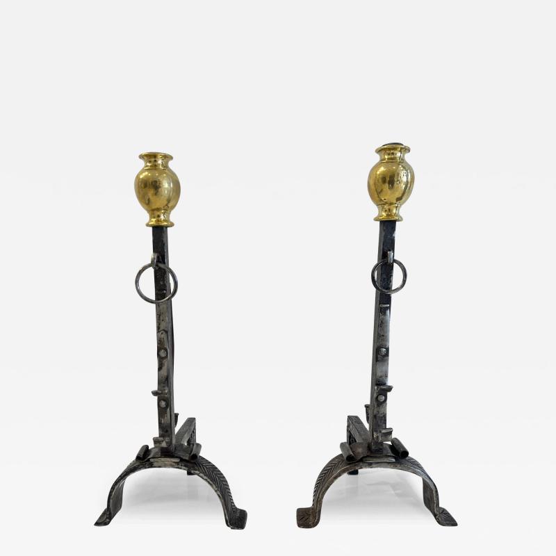 Pair of elegant Italian baroque period polished steel and brass andirons
