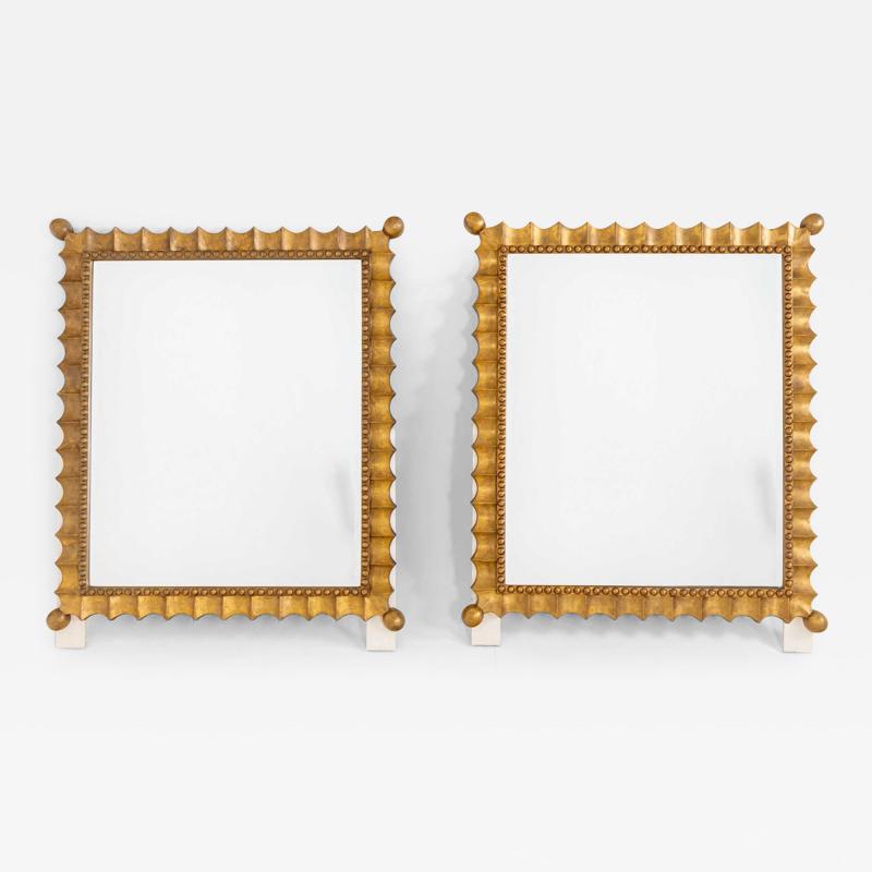 Pair of gold patinated Scalloped Wall Mirrors Mid 20th Century