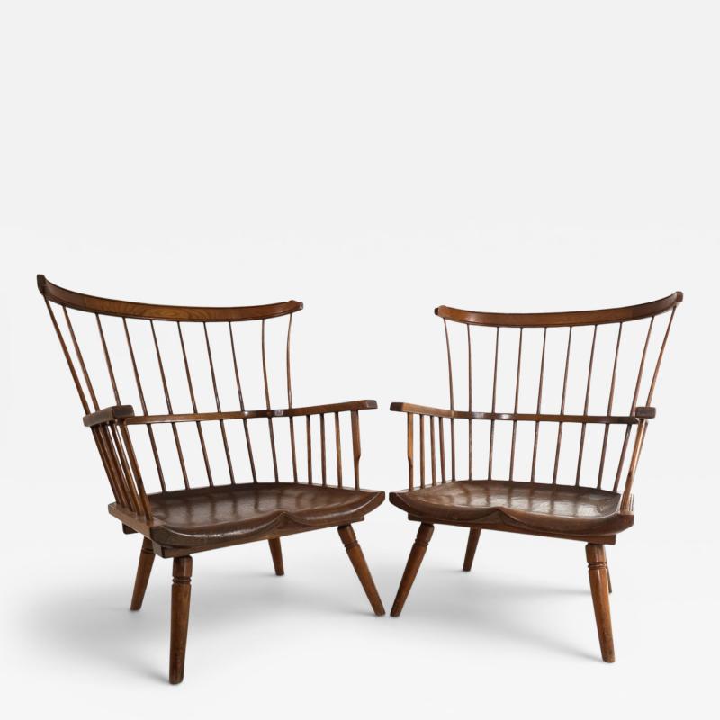Pair of handmade Windsor lounge chairs England circa 1960