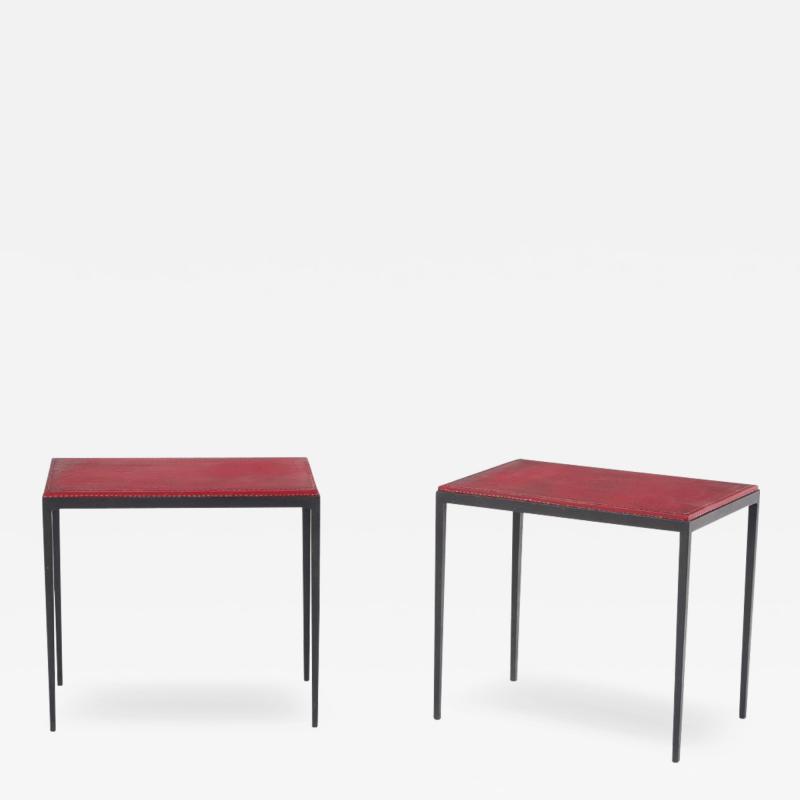 Pair of iron and deep red leather end tables in the manner of Jean Michel Frank 