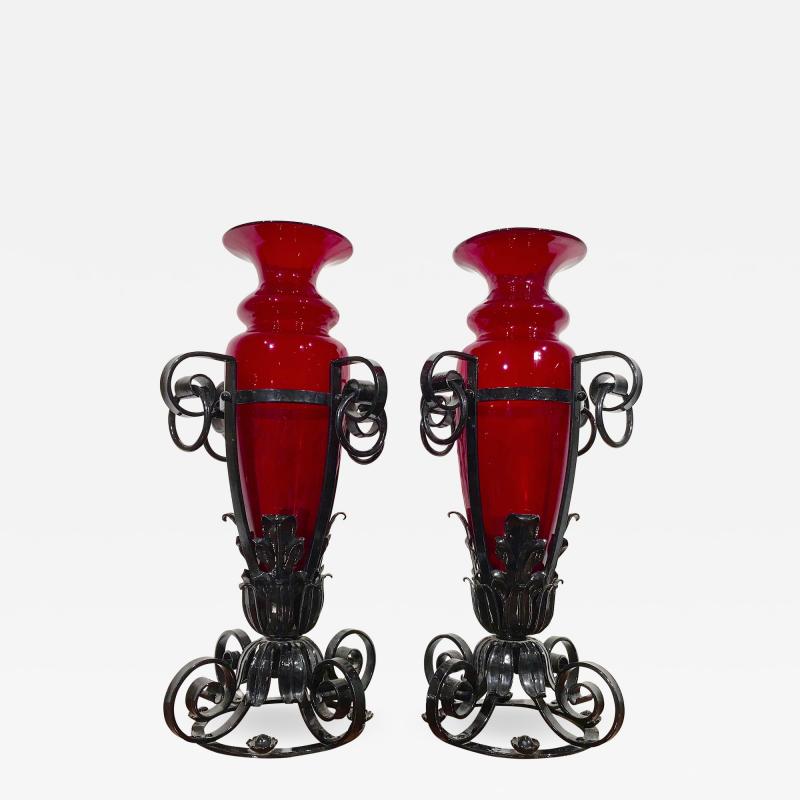 Pair of iron and red glass vases Italy 1920