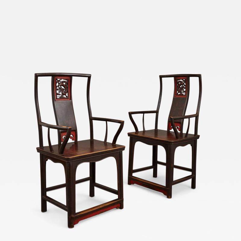 Pair of lacquered and painted Chinese yoke back armchairs