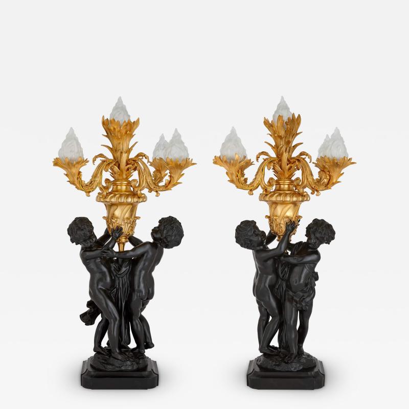 Pair of large Louis XVI style gilt and patinated bronze cherub candelabra