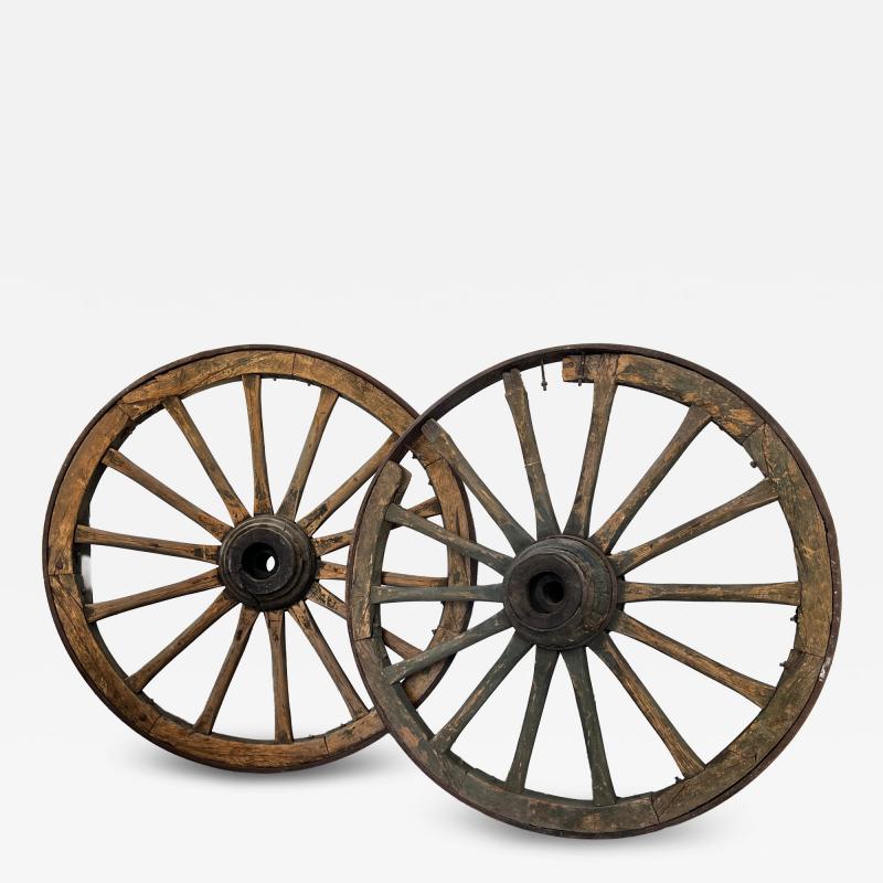 Pair of monumental wagon wheels from France