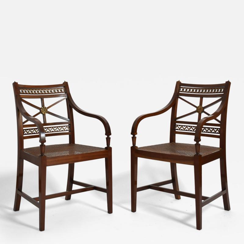 Pair of neoclassical mahogany and canning armchairs XIXth c 