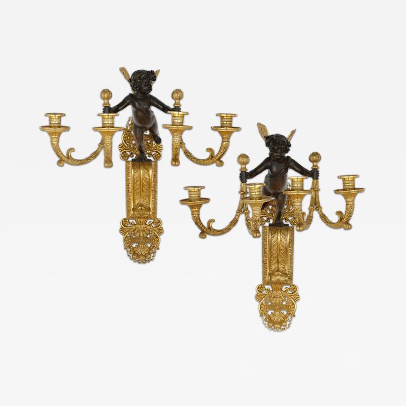 Pair of ormolu and patinated bronze Restauration period wall lights