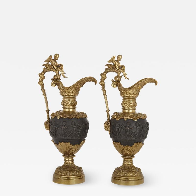 Pair of patinated bronze and ormolu ewer vases