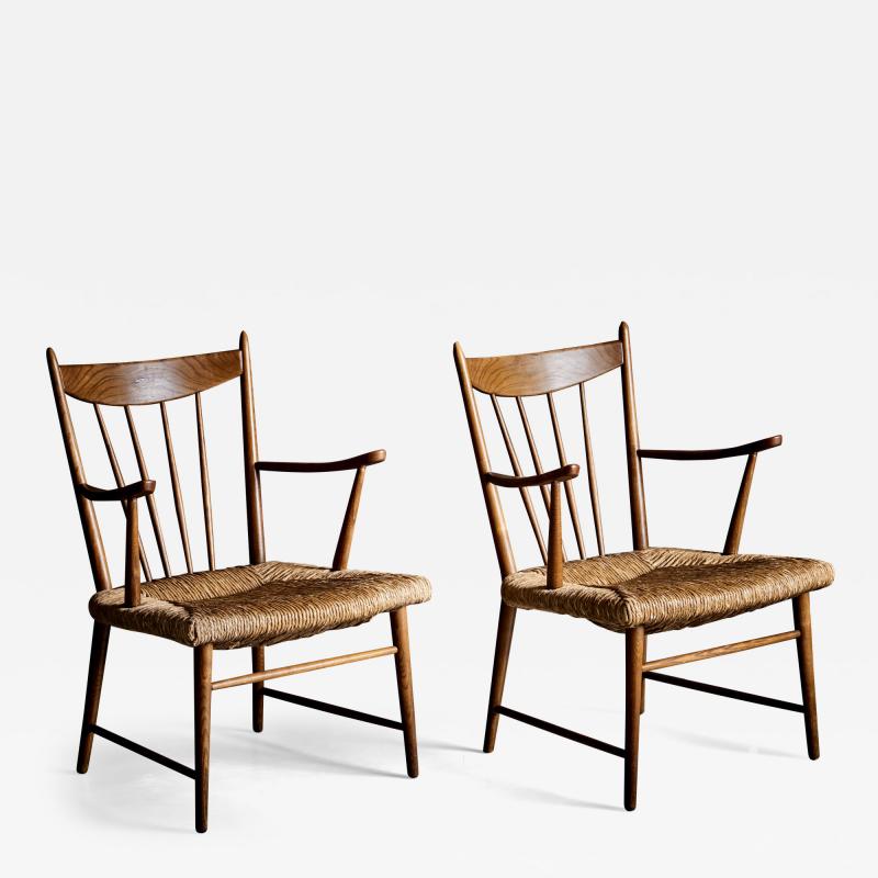 Pair of petit Dutch wooden lounge chairs with handwoven papercord seat