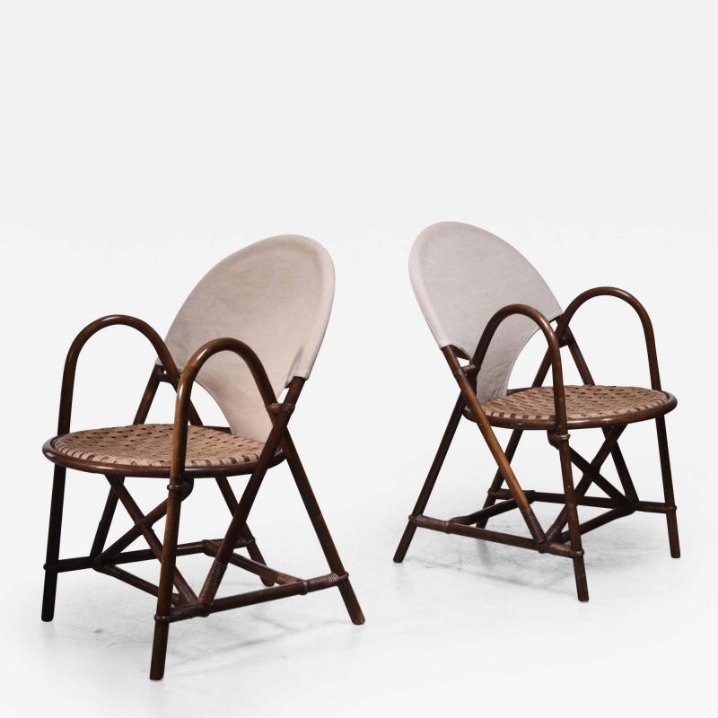 Pair of rattan and canvas chairs