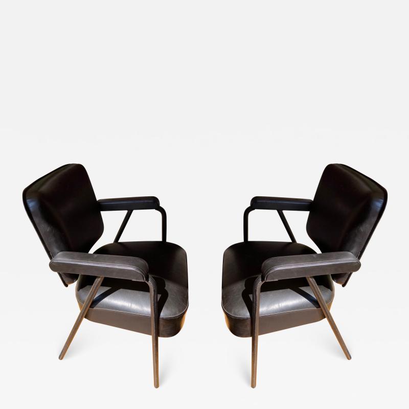 Pair of stitched Leather armchairs by Jacques Adnet