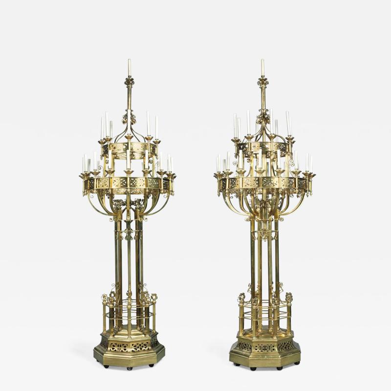 Pair of very large French brass candelabra in the Gothic Revival style