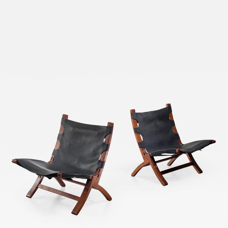 Pair of wood and leather sling chairs 1950s