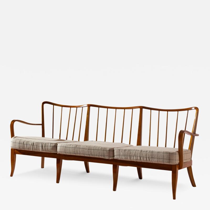 Paolo Buffa Three seater sofa in walnut and fabric in the style of Paolo Buffa Italy 1940s