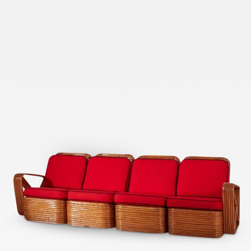 Paul Frankl A four seat rattan and fabric sectional sofa in the style of Paul Theodore Frank