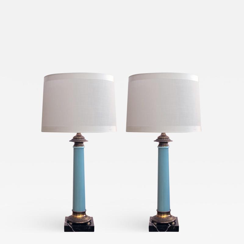 Paul Hanson An elegant pair of Paul Hanson columnar form pale blue glass lamps