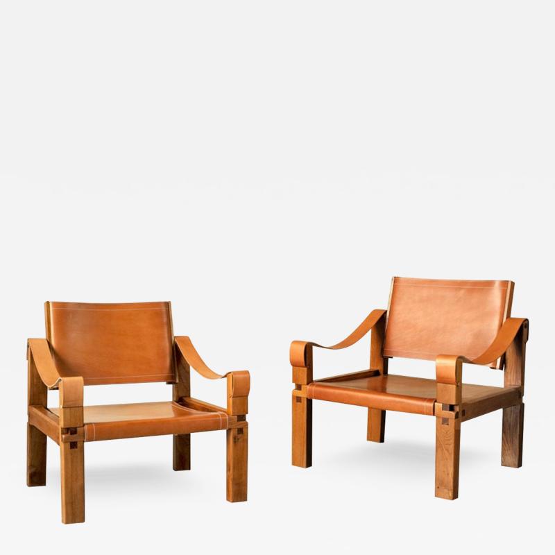 Pierre Chapo PAIR OF S10X SAHARA Elm and leather armchairs