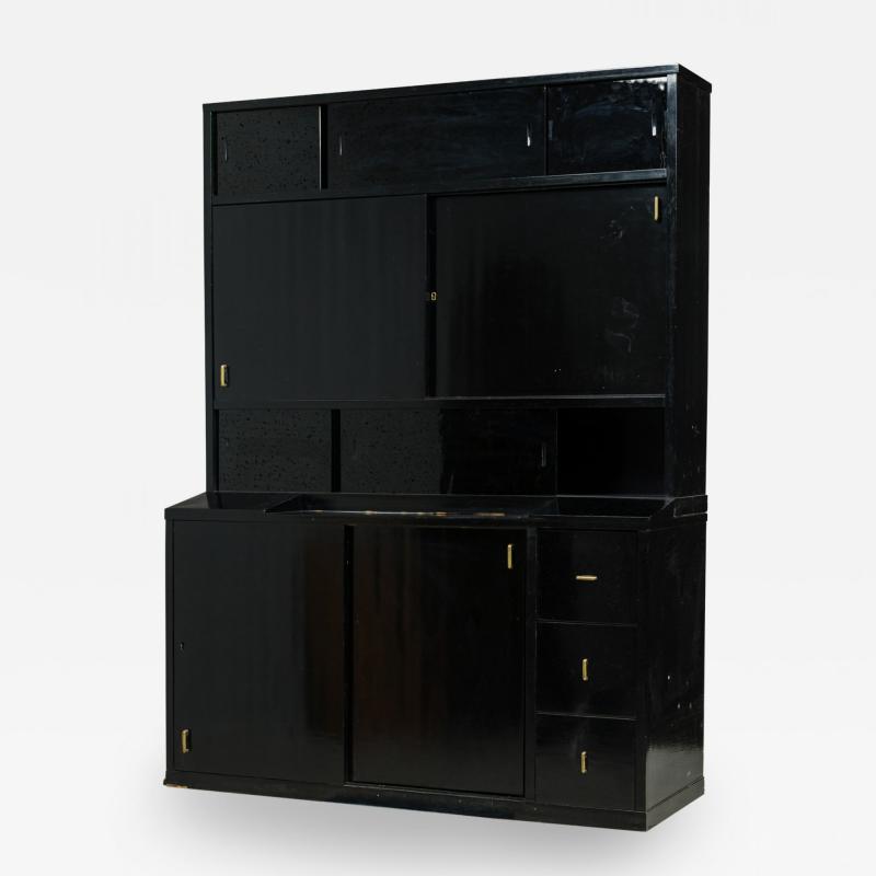 Pierre Chareau French Art Deco Two Piece Ebonized Tall Cabinet