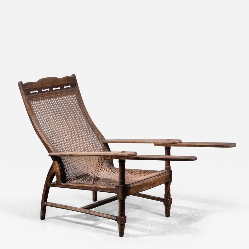 Planters chair in teak cane and brass Italy circa 1900