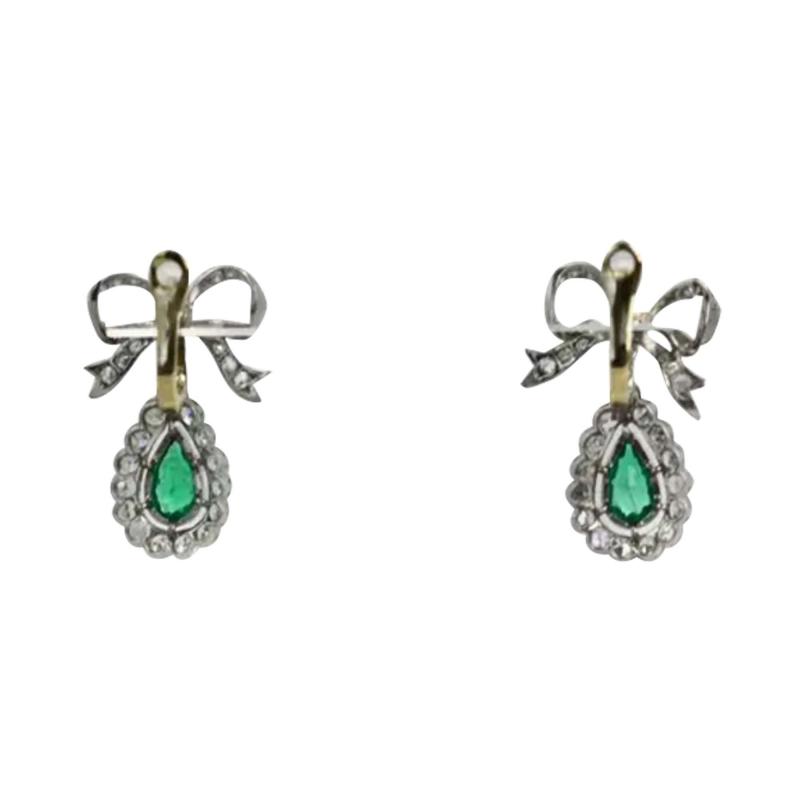 Platinum Emerald Diamond Bow Earrings