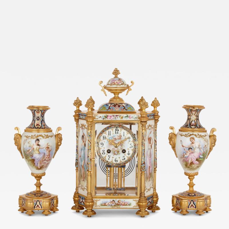 Porcelain champlev enamel and gilt bronze Rococo style three piece clock set