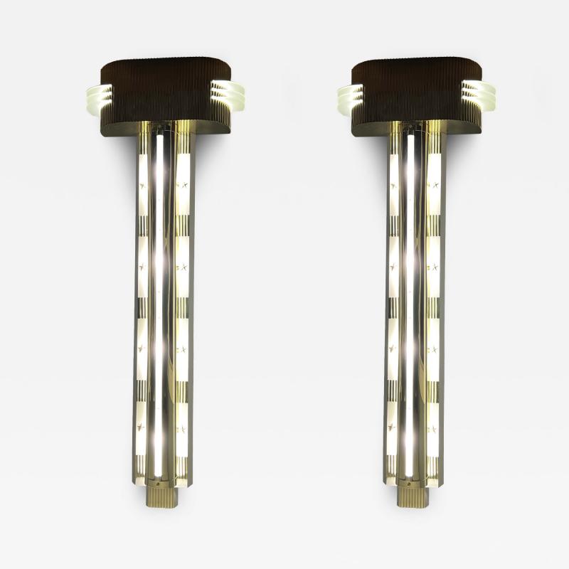 RARE MONUMENTAL POLISHED BRASS AND GLASS ART DECO SCONCES WITH STAR ACCENTS