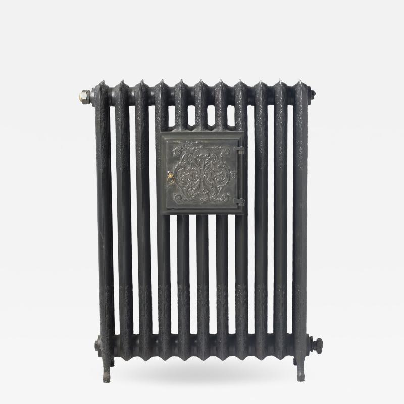 Radiator with plate warmer with floral decoration in cast iron