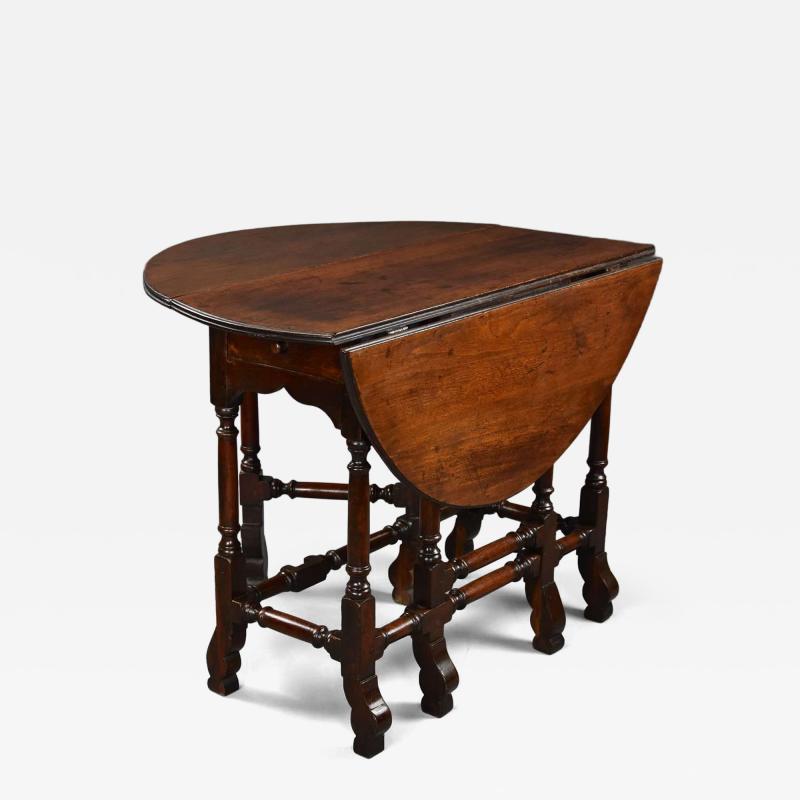 Rare 18thc red walnut gateleg table of small proportions fine patina
