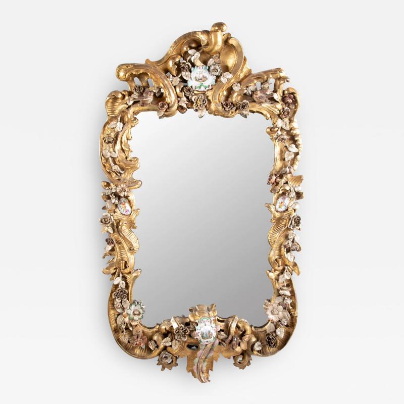 Rare Rococo German Giltwood Carved Mirror with Porcelain Medallions Insets
