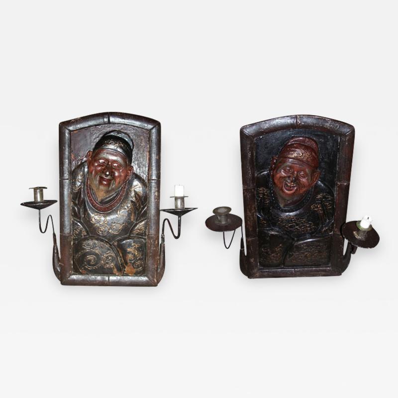 Rare pair of 19th century sconces with Chinese personages