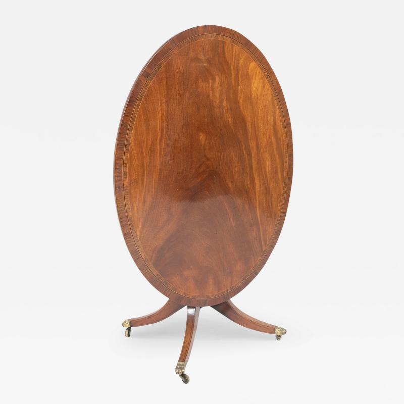 Regency Oval Triple Banded Mahogany Tilt Top Breakfast Table