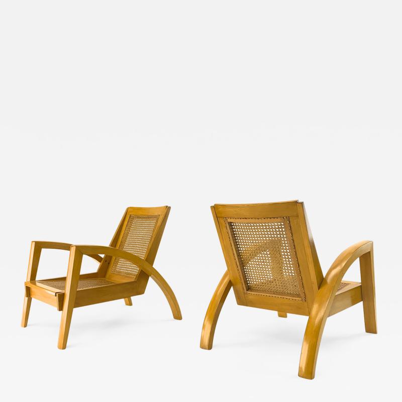 Riviera style pair of blond canned lounge chairs