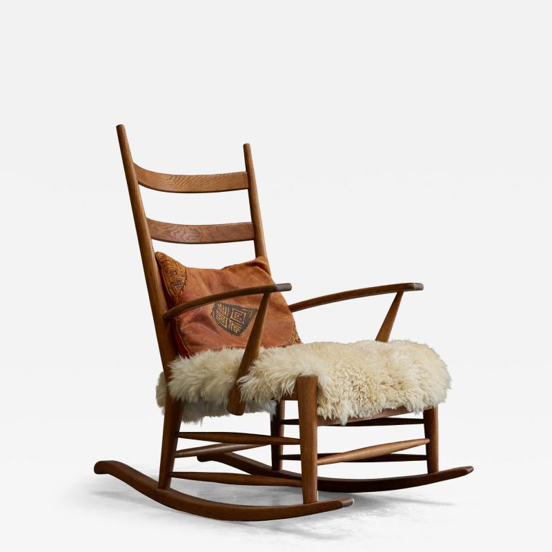 Rocking Chair in Solid Oak and Sheepskin France 1960s