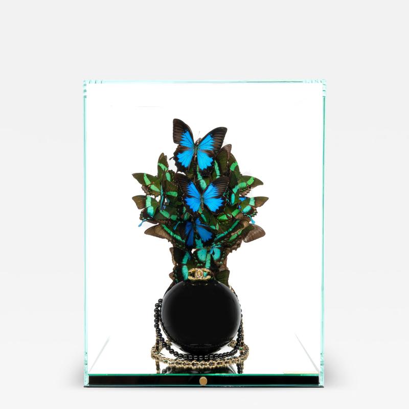 Roman Feral Chanel Black Pearl Emerald Indonesia